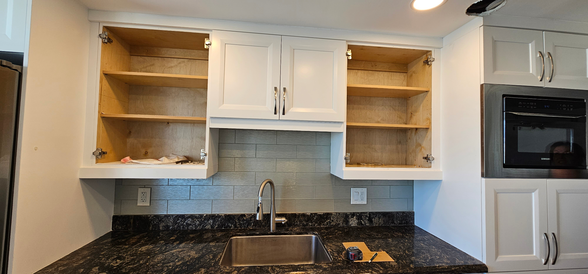 Kitchen sink area with GFCI outlets and dimmer wired by MG Electrical