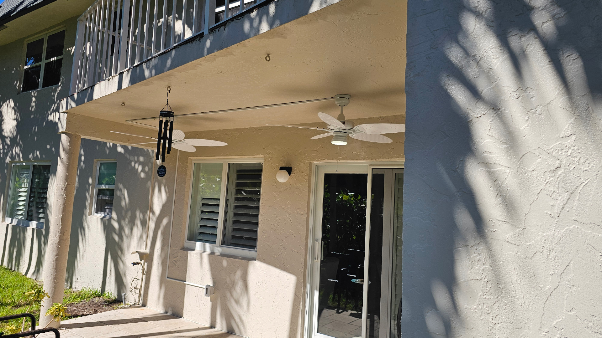 Outdoor patio ceiling fan and wall sconce installation by MG Electrical