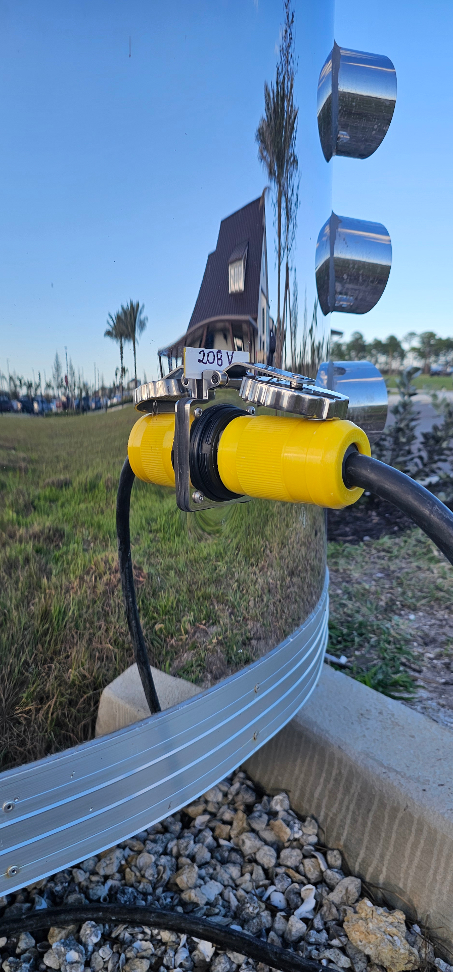 208V shore power connection wired to a stainless concession trailer